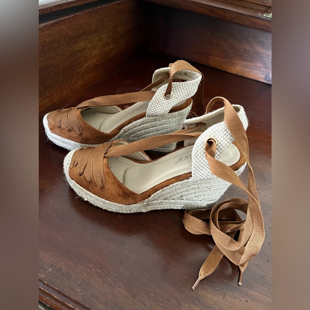 High-heel closed-toe dark brown suede lace-up espadrilles from Spain.